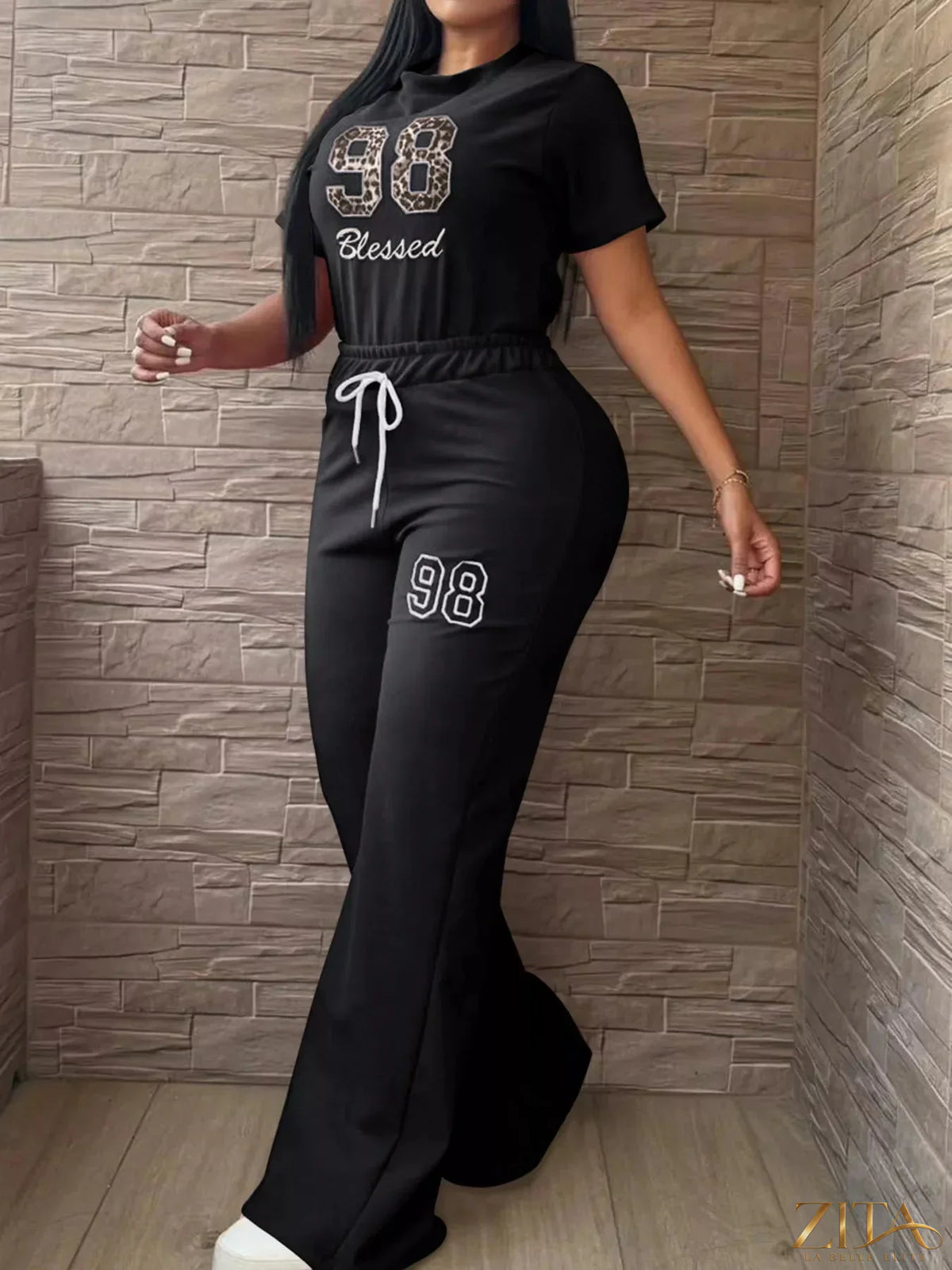 Zita La Belle Elite leopard print crop top and wide-leg pants set with bold pattern and stylish fit.