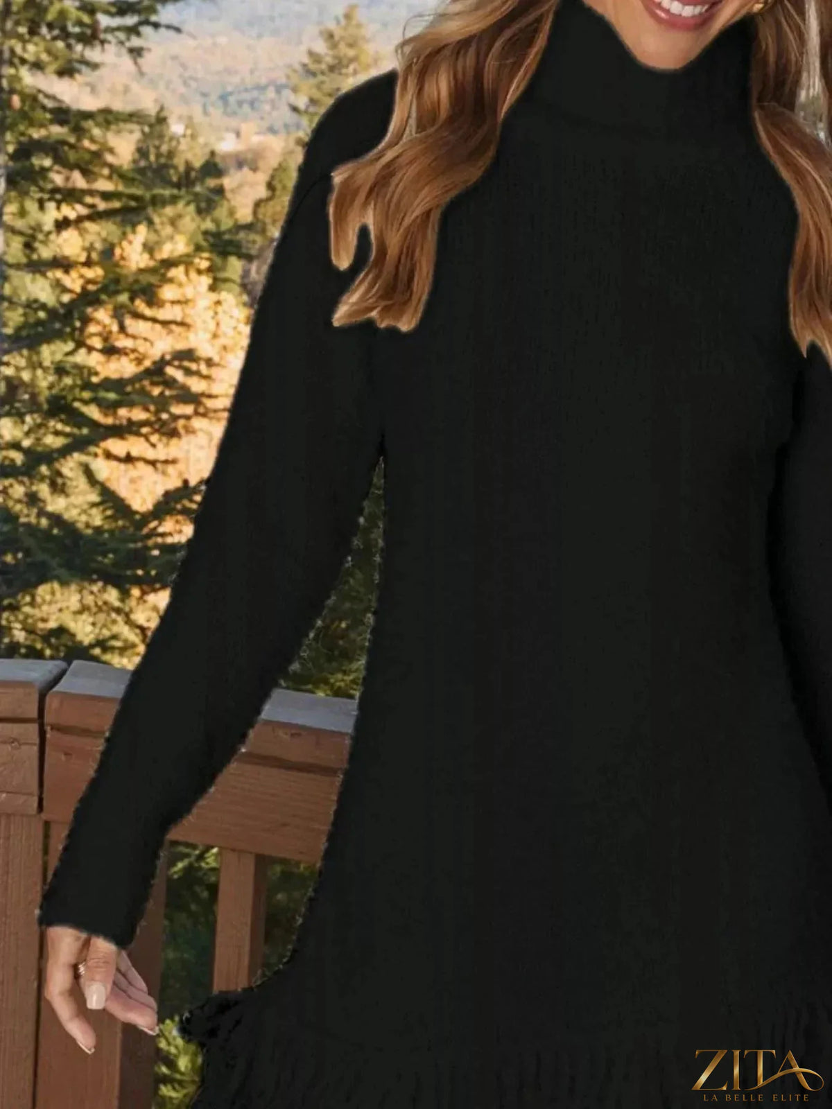 Long sleeve fringe turtleneck sweater dress from Trendsi, featuring a cozy fit with stylish fringe details down the sides.