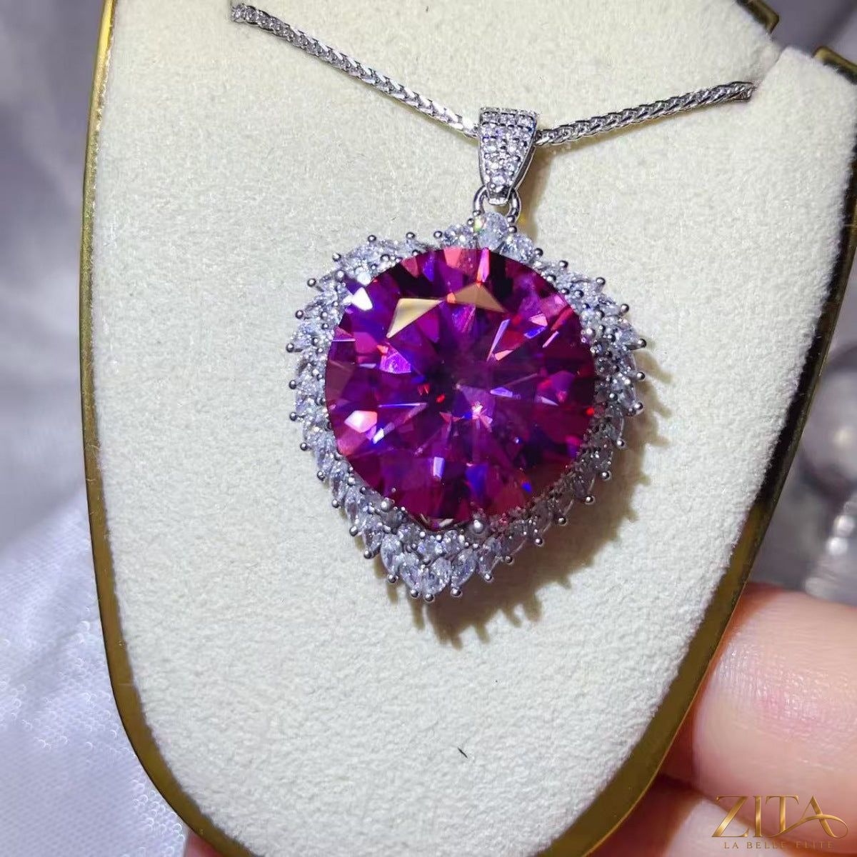 Sterling silver pendant necklace featuring a 20-carat moissanite gemstone, elegant jewelry piece with a delicate chain.