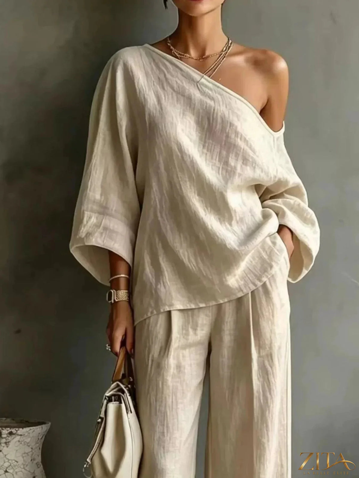 Zita La Belle Elite one shoulder top and wide-leg pants set, featuring a stylish asymmetrical top and flowing wide-leg trousers.