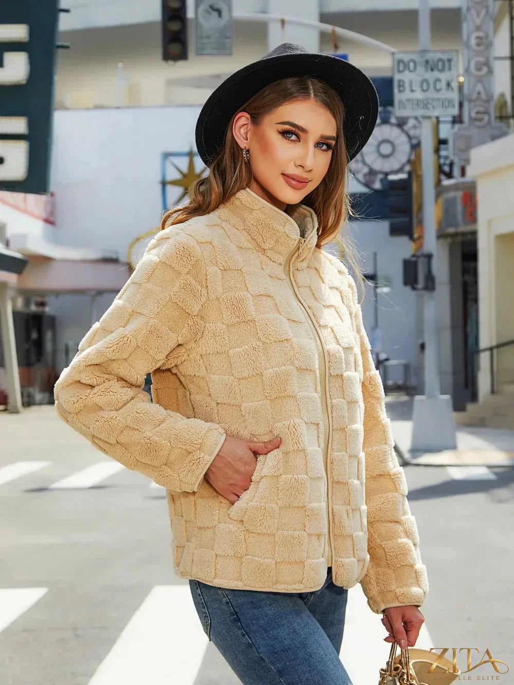 Zita La Belle Elite fuzzy checkered zip-up jacket with a soft, cozy texture and stylish plaid pattern on the front.