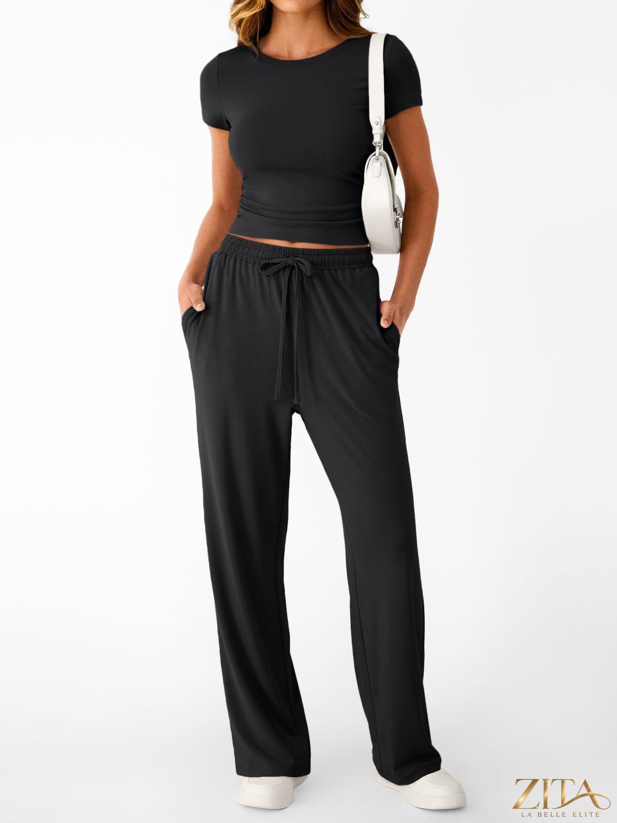 Trendsi round neck short sleeve tee and matching pants set displayed on a model, casual and comfortable outfit for everyday wear.