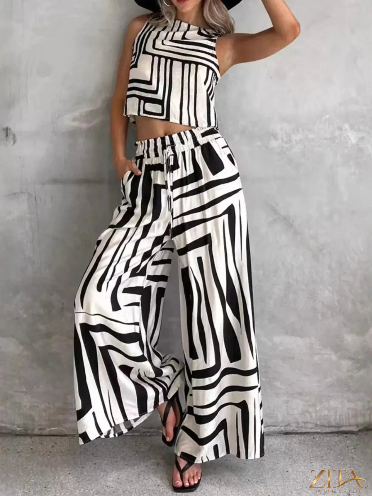 Zita La Belle Elite geometric print sleeveless top and wide-leg pants set, featuring a modern, stylish design in vibrant colors.