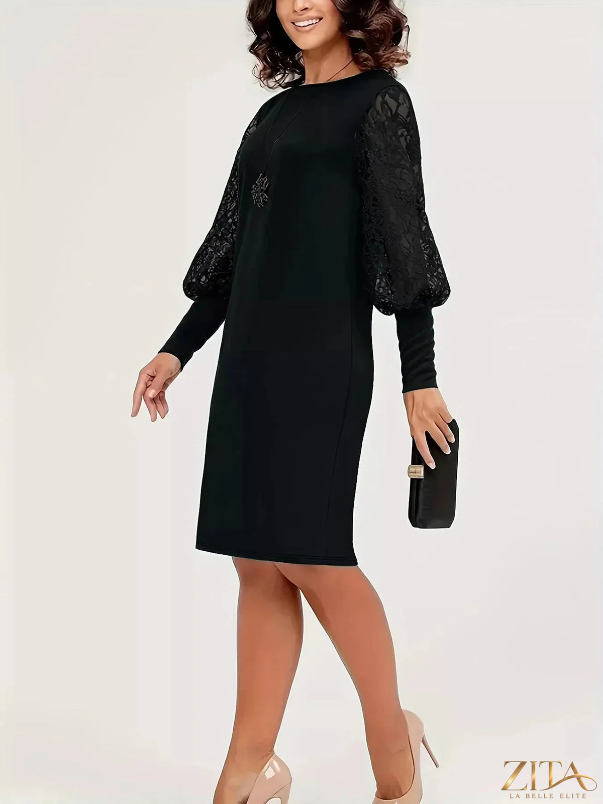 Lace lantern sleeve dress from Trendsi featuring intricate lace details and flowing silhouette, perfect for elegant occasions.