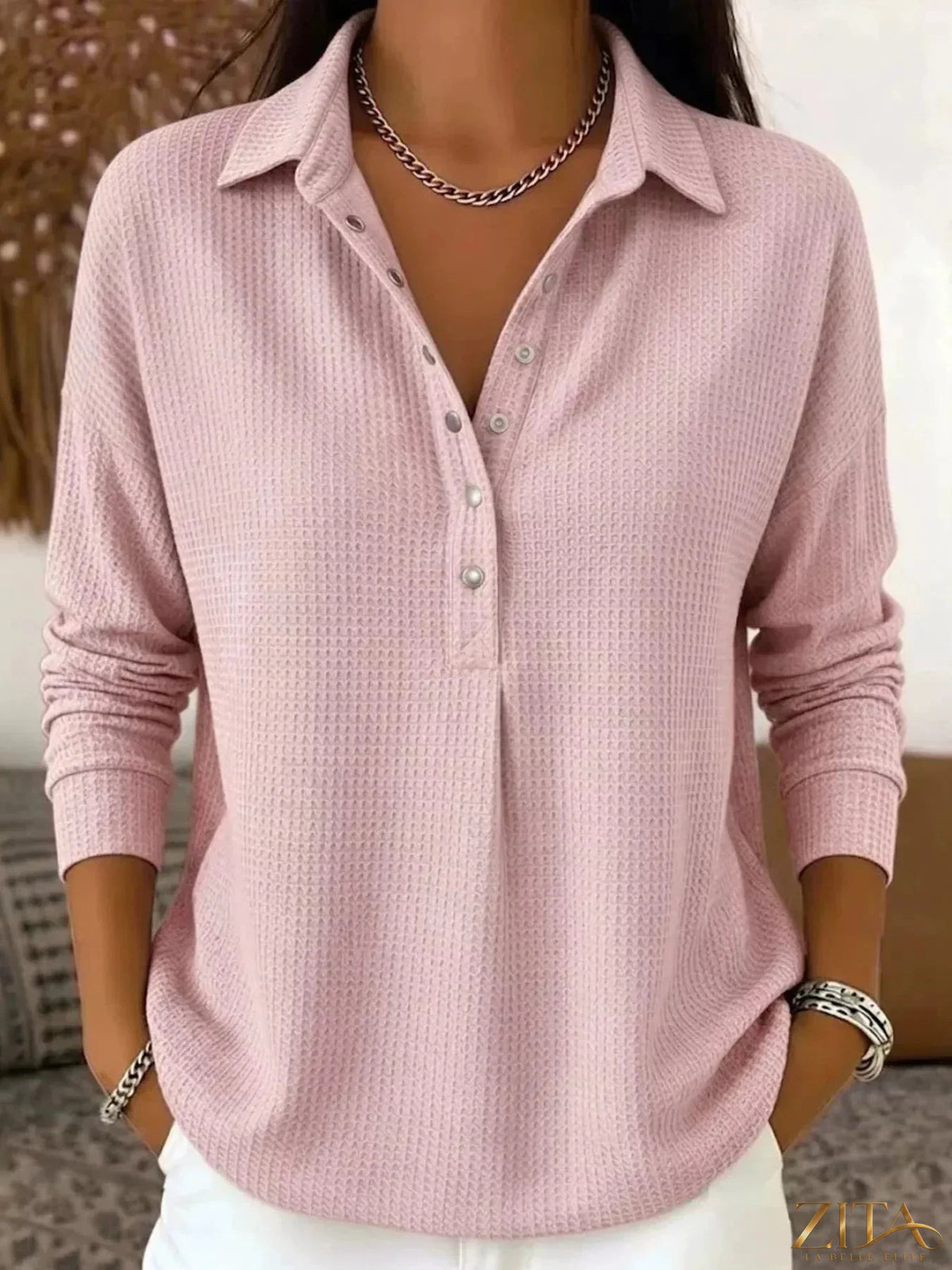 Waffle knit snap-down blouse by Zita La Belle Elite featuring a textured fabric and button-down front.