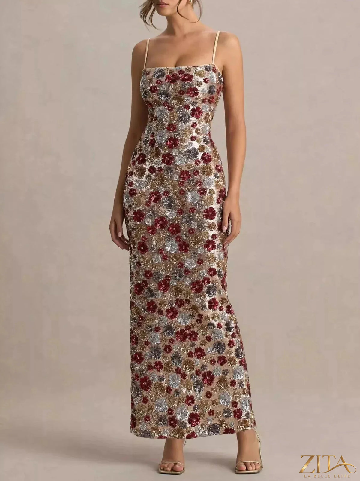 Zita La Belle Elite floral sequin bodycon maxi dress with a slit, featuring a fitted silhouette and vibrant floral pattern.
