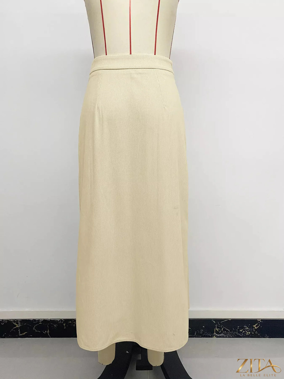 Zita La Belle Elite high waist pleated midi skirt in flowy fabric, showcasing its elegant design and classic silhouette.