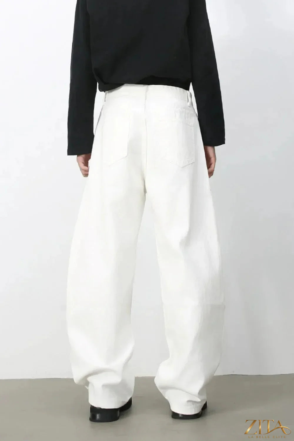 Men's high rise wide leg jeans by Zita La Belle Elite, showcasing the relaxed fit and stylish denim silhouette.