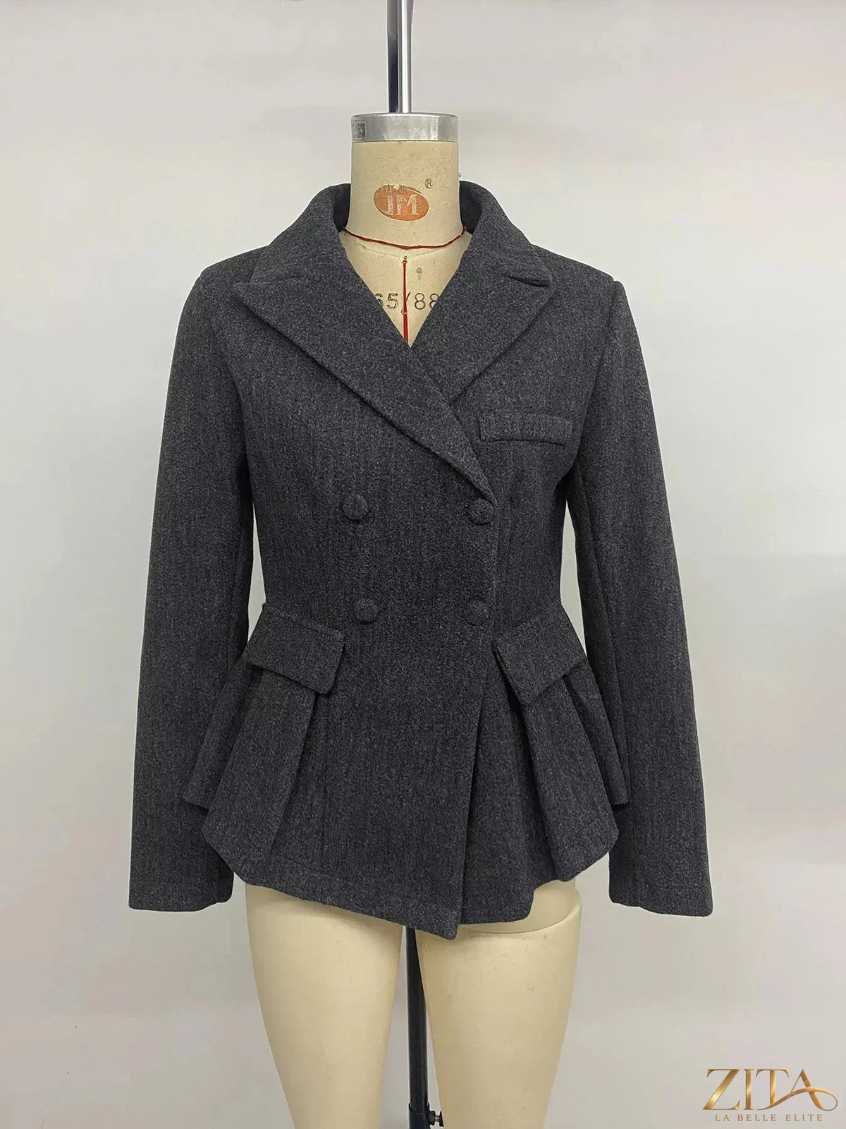 Zita La Belle Elite double-breasted peplum blazer in navy, tailored fit with structured lapels and button details.