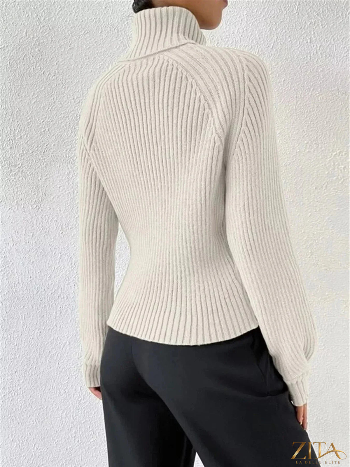 Zita La Belle Elite ribbed knit turtleneck sweater in a cozy, fitted design with a high collar and textured ribbing detail.
