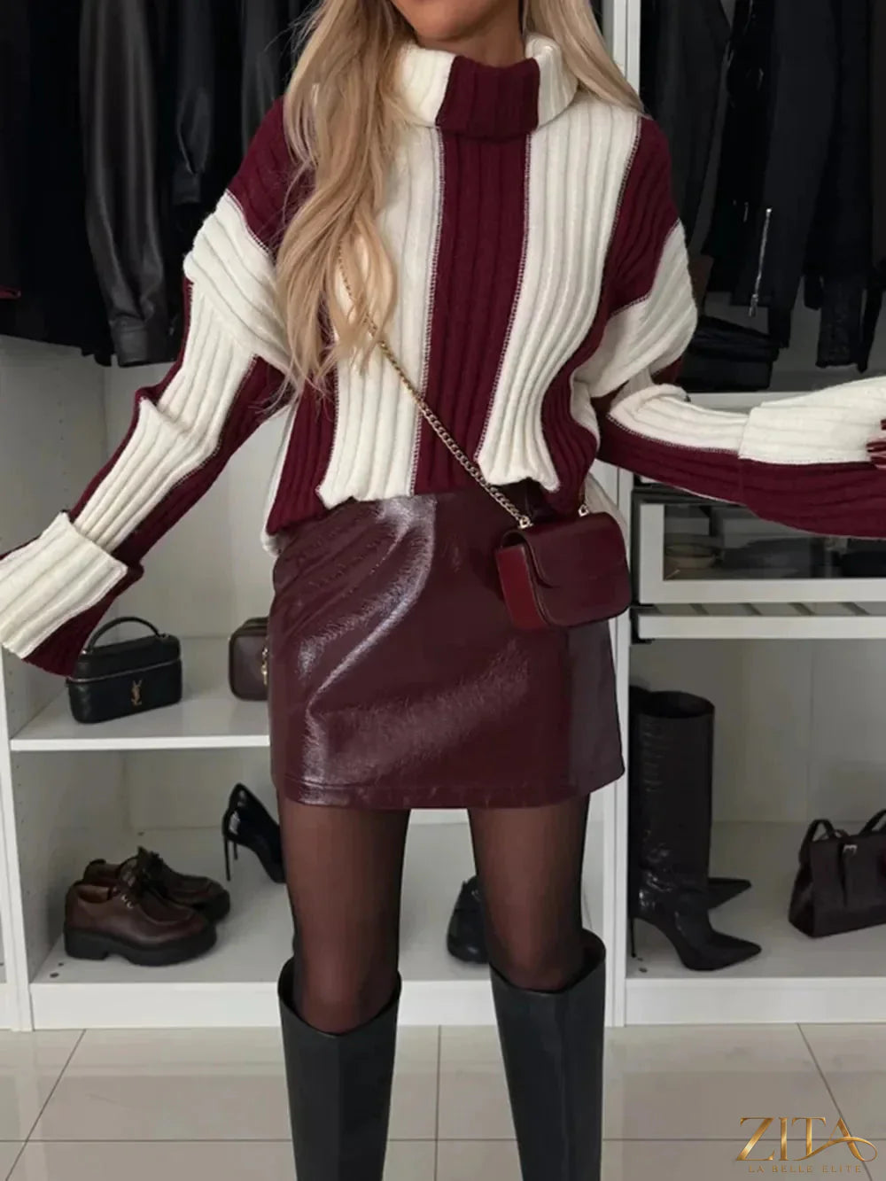Striped turtleneck dropped shoulder sweater by Trendsi, featuring a cozy knit with colorful horizontal stripes and relaxed fit.