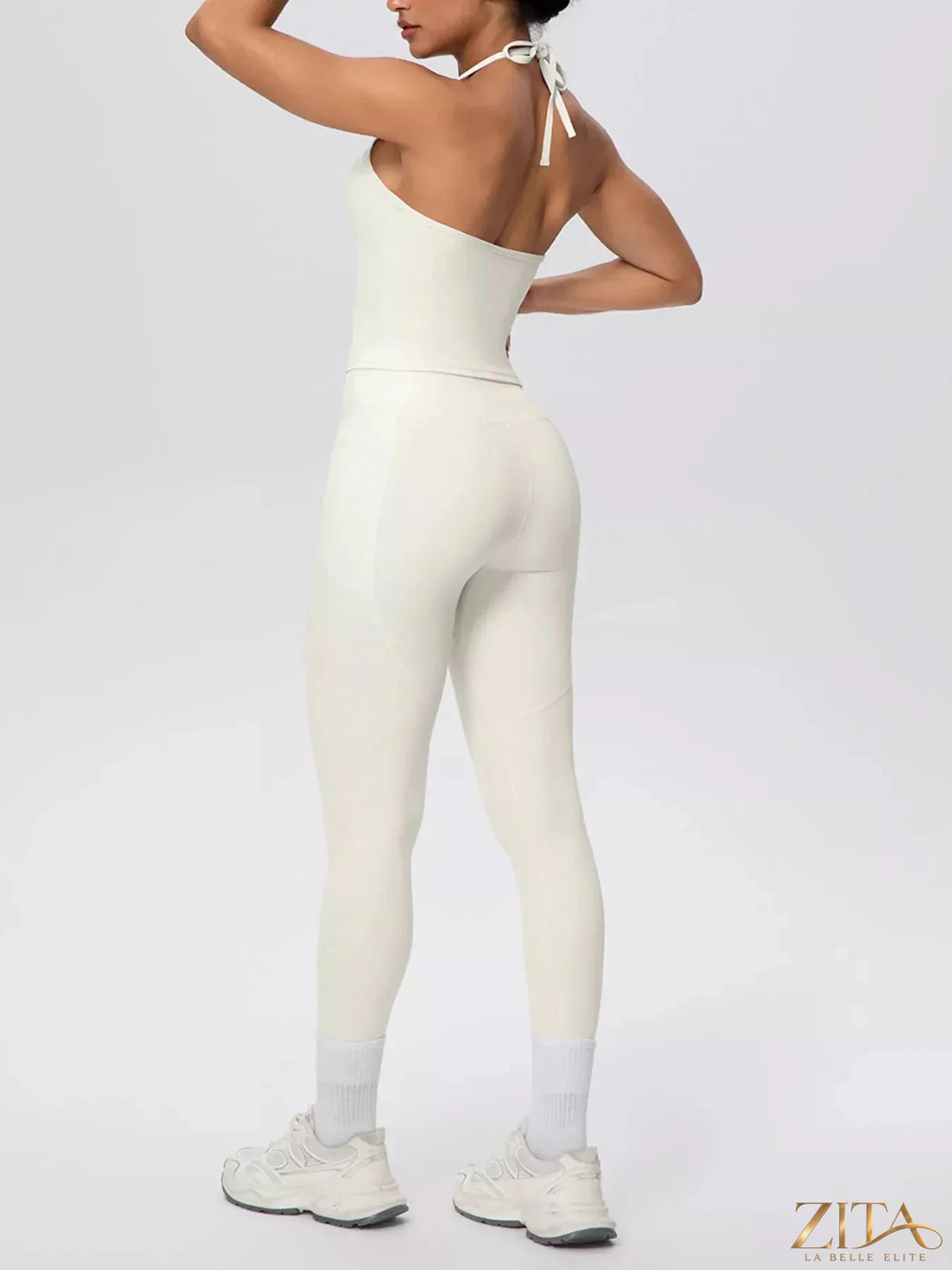 Zita La Belle Elite halter neck cami and high-waisted leggings active set, featuring a sleek black design and supportive fit.