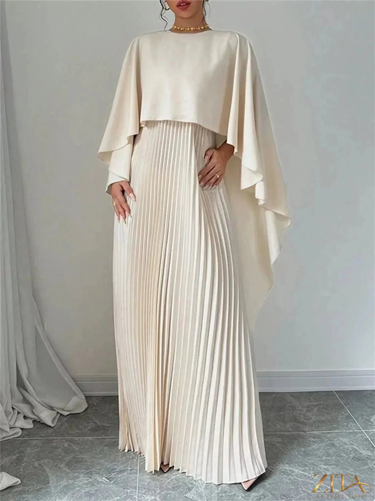 Elegant navy cape pleated maxi dress by Trendsi featuring flowing fabric and a stylish design, perfect for formal occasions.
