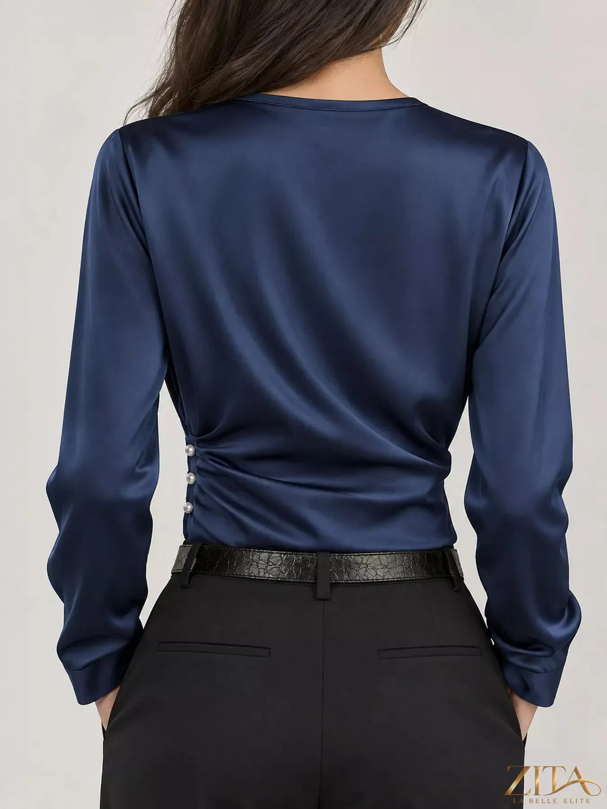 Zita La Belle Elite satin surplice long sleeve blouse with elegant drape and V-neck, in a smooth, shiny fabric.