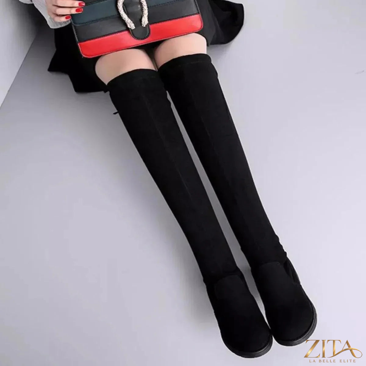 Over-the-knee block heel boots by Zita La Belle Elite, featuring sleek design and fashionable footwear for stylish looks.