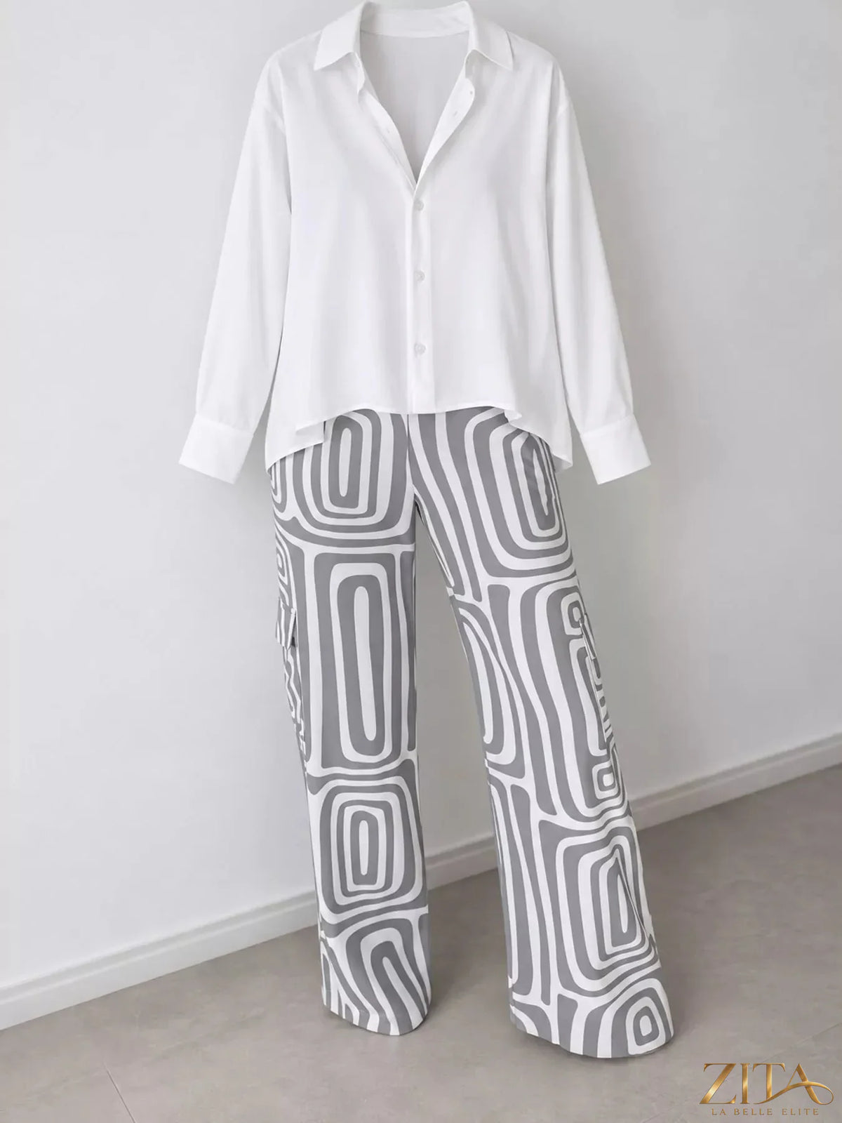 Plus size Zita La Belle Elite button-down shirt and geometric wide-leg pants set displayed on a model.