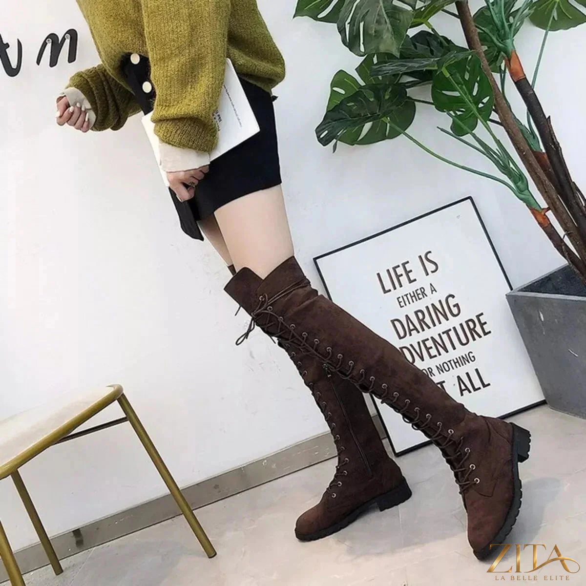 Over-the-knee lace-up boots by Trendsi featuring a sleek design and high-quality leather finish.