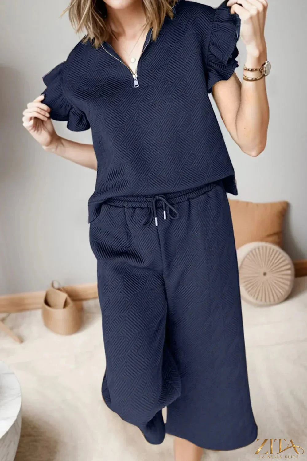 Zita La Belle Elite ruffled quarter zip top and drawstring pants set, soft fabric, stylish casual wear, front view, light-colored ensemble