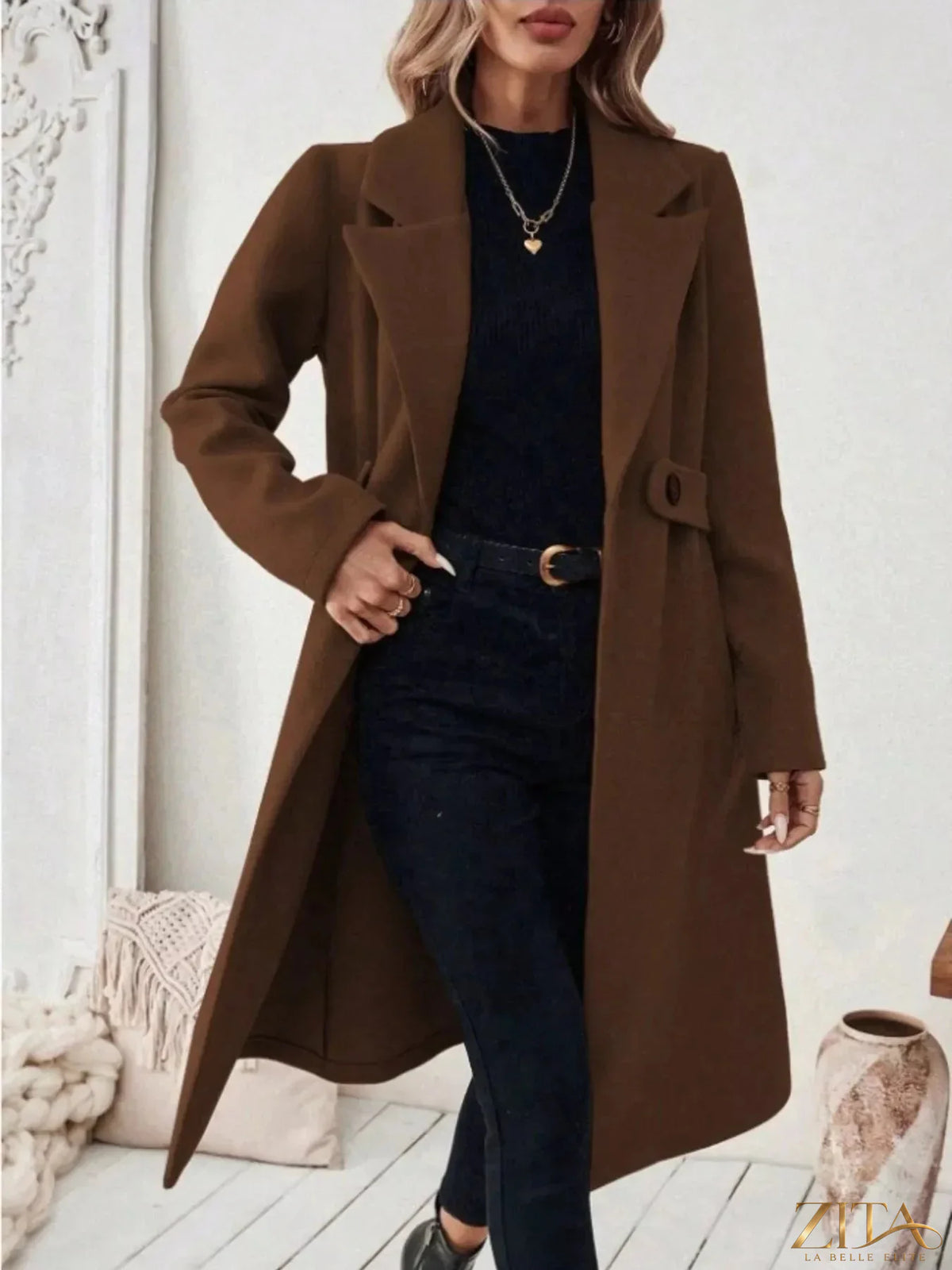 Plus size Zita La Belle Elite elegant coat with lapel collar, belt, and pockets, showcasing a stylish full-size coat on a model.