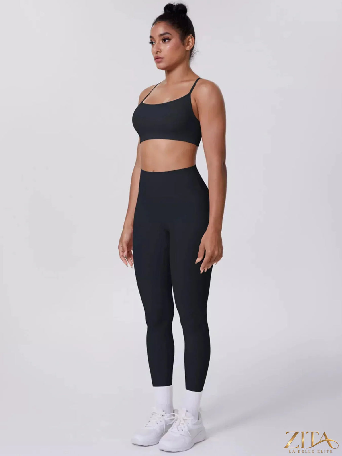 Zita La Belle Elite criss-cross back cami and matching leggings active set, black, form-fitting workout apparel on a model.