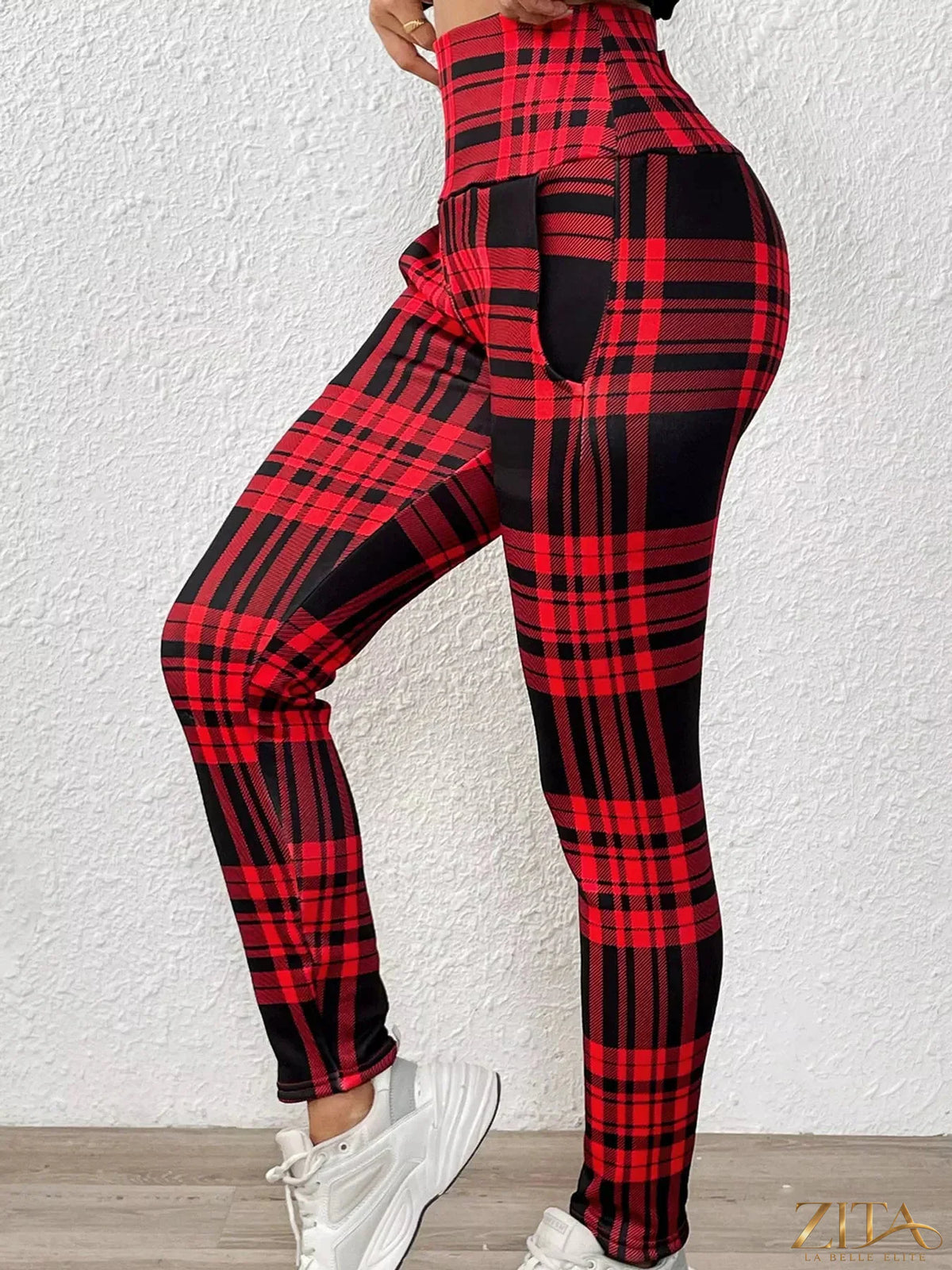 High-waisted plaid slim-fit leggings by Trendsi, featuring a stylish checkered pattern and a comfortable, form-fitting design.