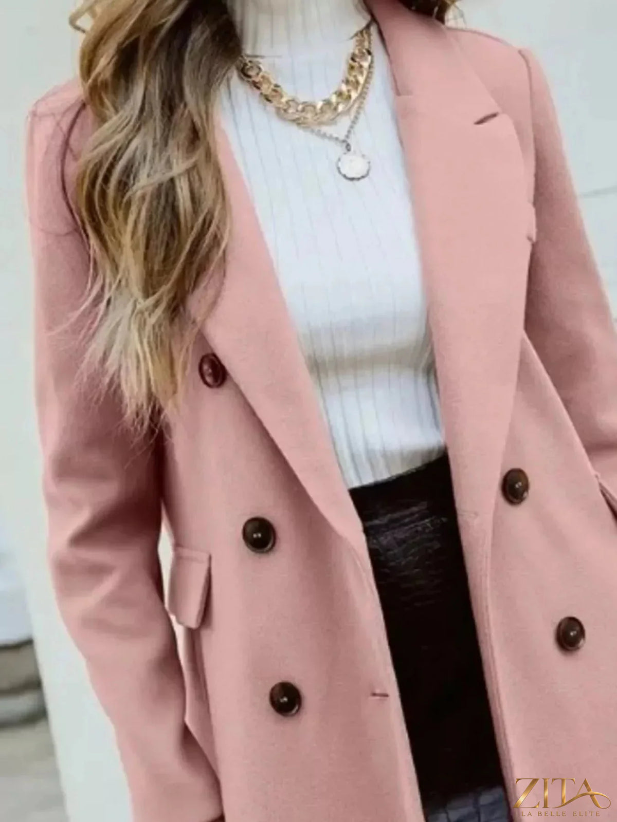 Zita La Belle Elite double-breasted longline coat in dark fabric, tailored with wide lapels and a sleek, elegant design.