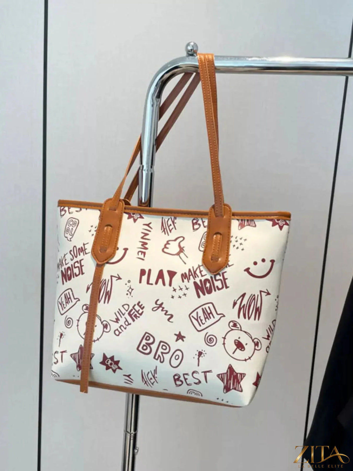 Zita La Belle Elite graffiti print casual tote bag with colorful urban art design and sturdy handles on a plain background.