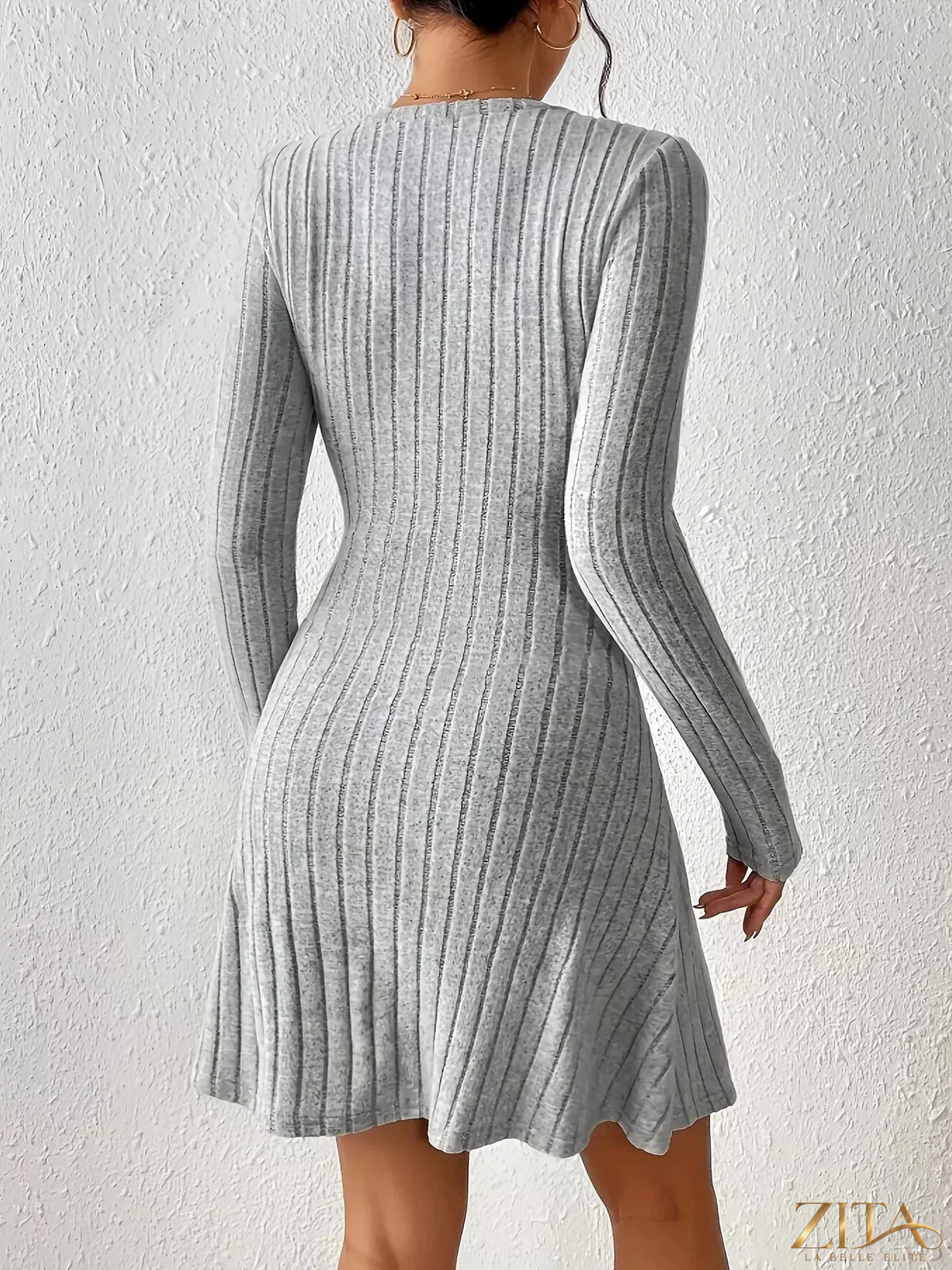 Zita La Belle Elite ribbed knit tie waist long sleeve casual dress with a fitted silhouette and textured fabric.