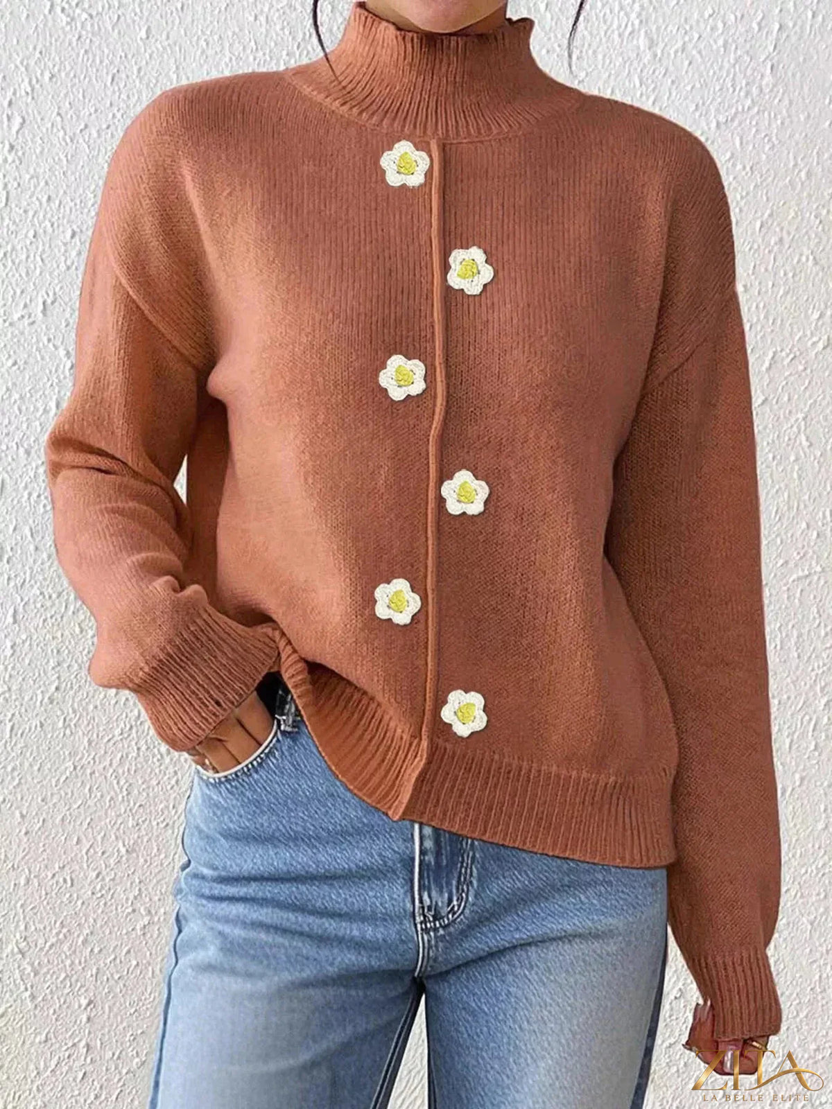 Zita La Belle Elite floral applique turtleneck sweater featuring colorful floral embroidery on a cozy knitted fabric.