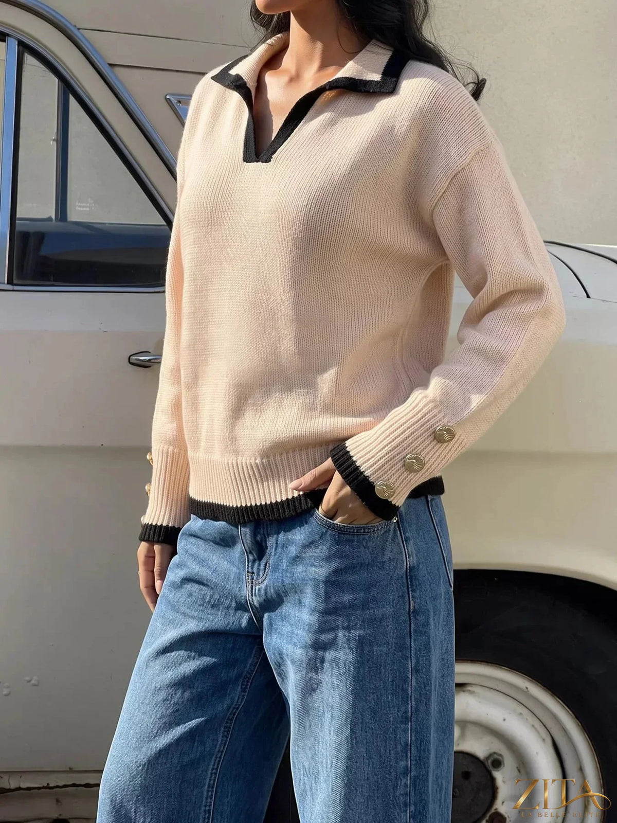 Zita La Belle Elite contrast trim polo collar sweater featuring a classic knit design and ribbed cuffs on a neutral background.