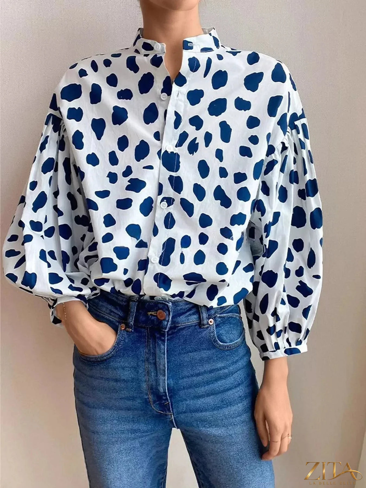 Printed puff sleeve button-down shirt by Zita La Belle Elite, featuring a stylish pattern and classic collar detail.