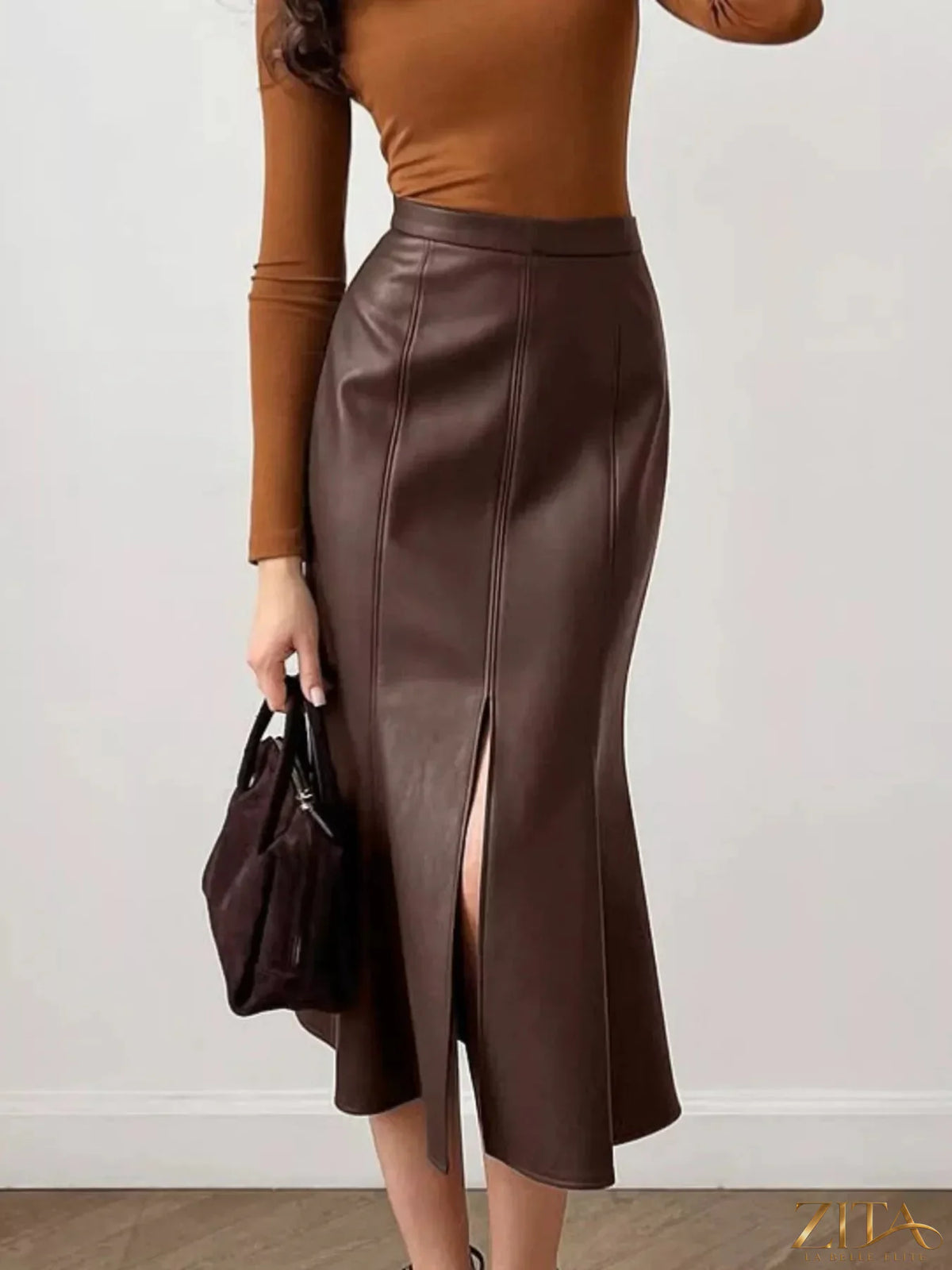Zita La Belle Elite slit mermaid midi skirt in flowing fabric, showcasing a fitted silhouette with a dramatic slit at the side.