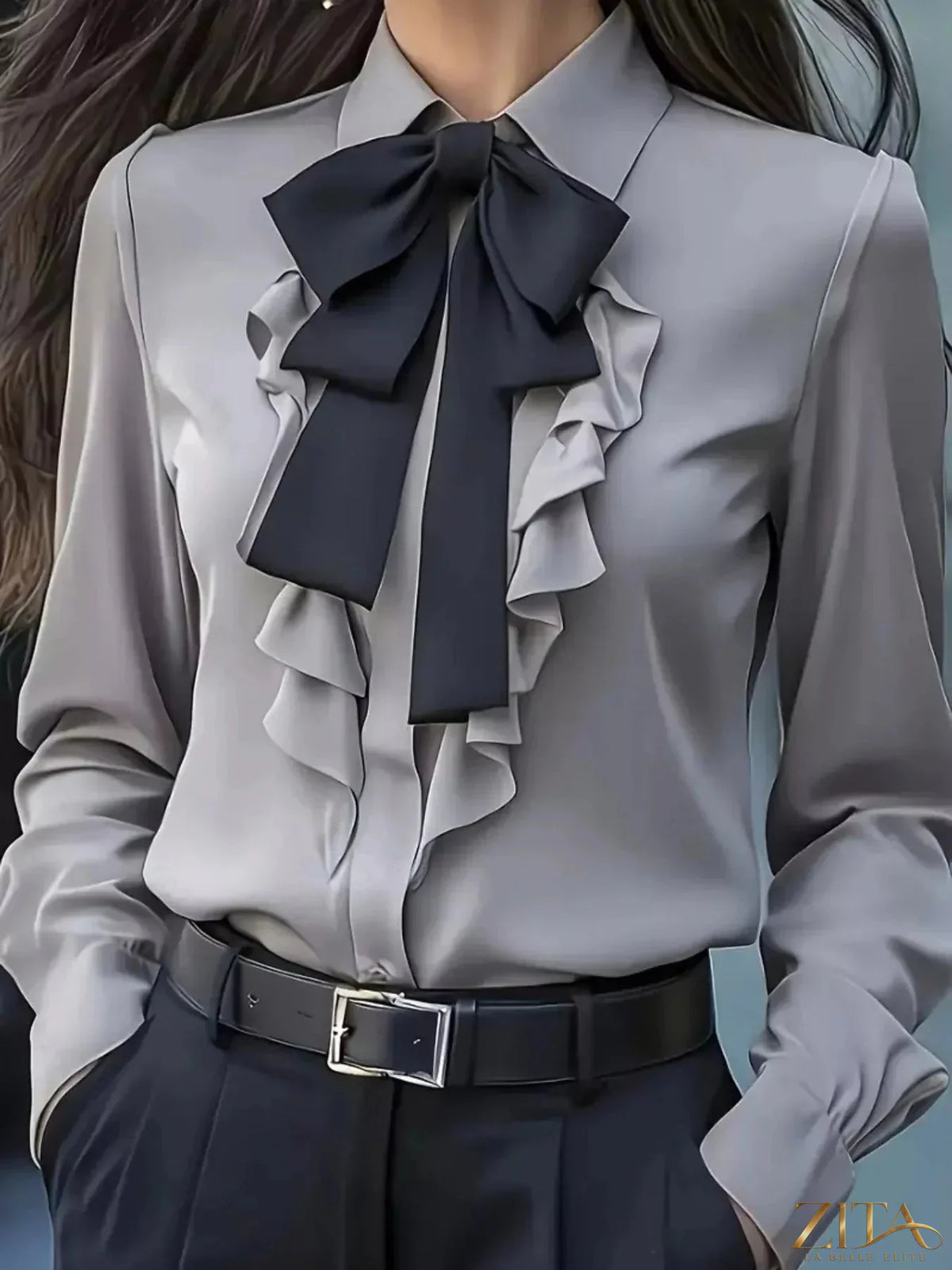 Zita La Belle Elite ruffled tie-front long sleeve blouse with feminine details and soft fabric, shown on a hanger.
