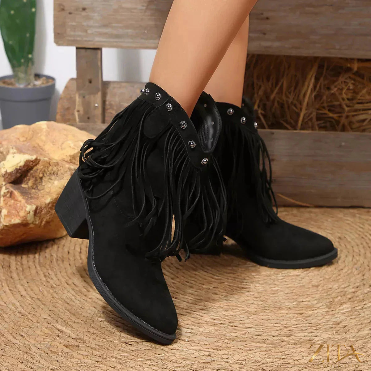 Trendsi fringed point toe boots featuring a stylish design with fringe details and a sleek pointed toe silhouette.