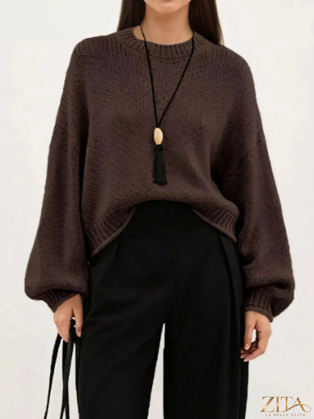 Oversized chunky knit sweater by Trendsi, featuring a cozy, thick knit design in a relaxed fit, ideal for casual winter wear.