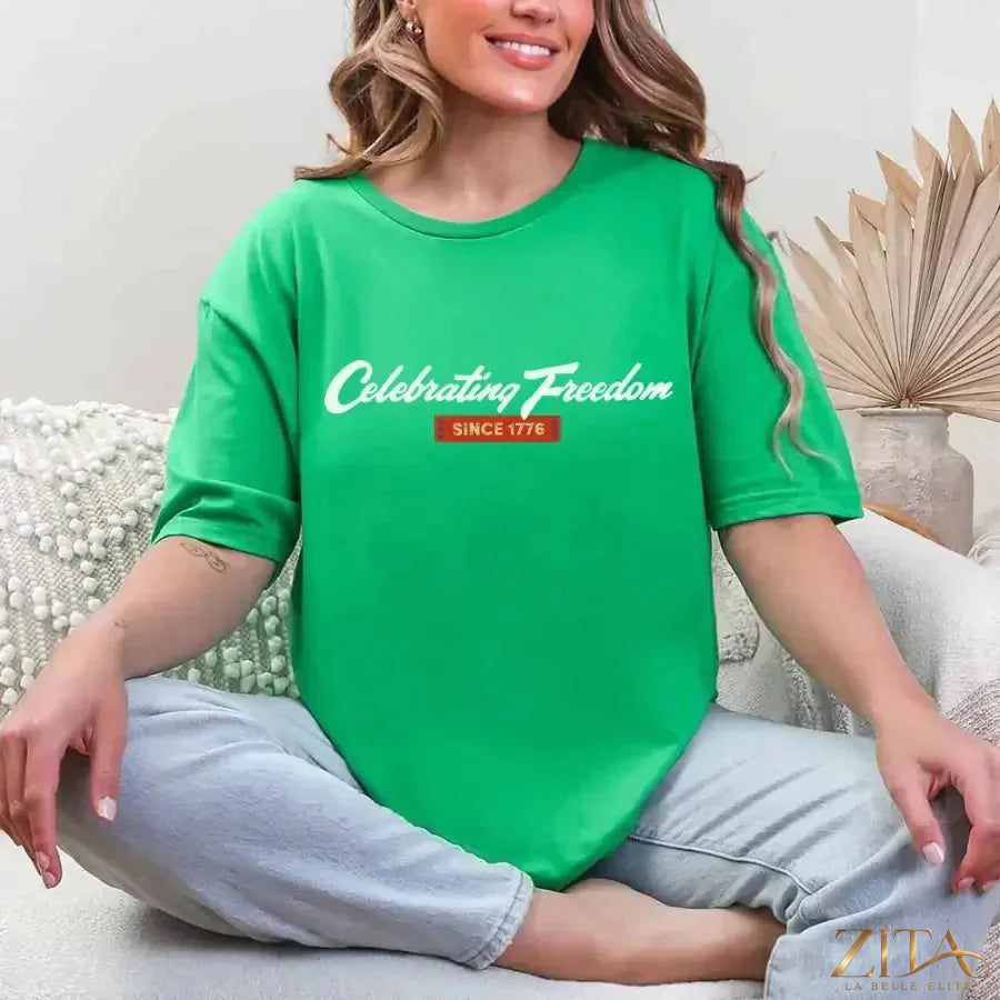 Green patriotic T-shirt by Zita La Belle Elite featuring "Celebrating Freedom Since 1776" for 4th of July celebration.