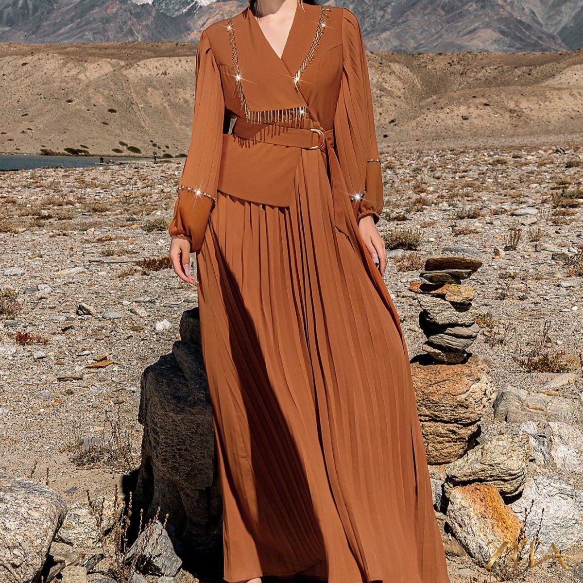 Elegant Zita La Belle Elite hand-beaded V-neck pleated maxi gown with bubble sleeves and crystal embellishments.