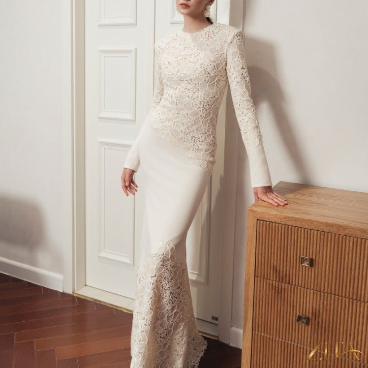 Lace embroidered vintage mermaid gown by Zita La Belle Elite featuring an elegant fishtail design and intricate lace details.