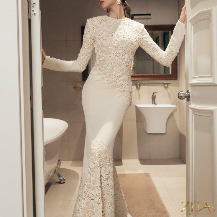 Lace embroidered vintage mermaid gown by Zita La Belle Elite featuring intricate lace details and a flattering fishtail design.