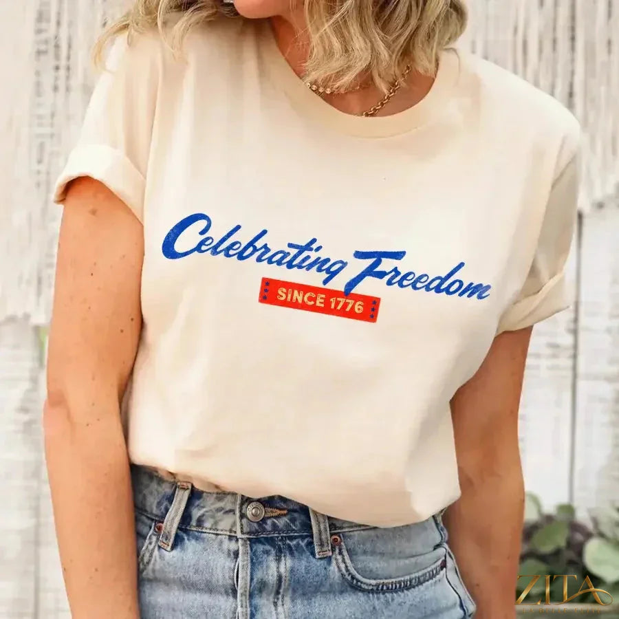 Soft cream 4th of July T-shirt by Zita La Belle Elite featuring patriotic design celebrating freedom since 1776.