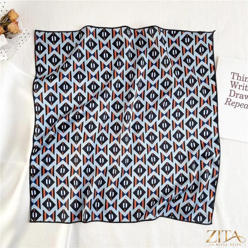 Printed square silk neck scarf by Zita La Belle Elite, featuring a vibrant, fashionable design perfect for women's stylish accessories.