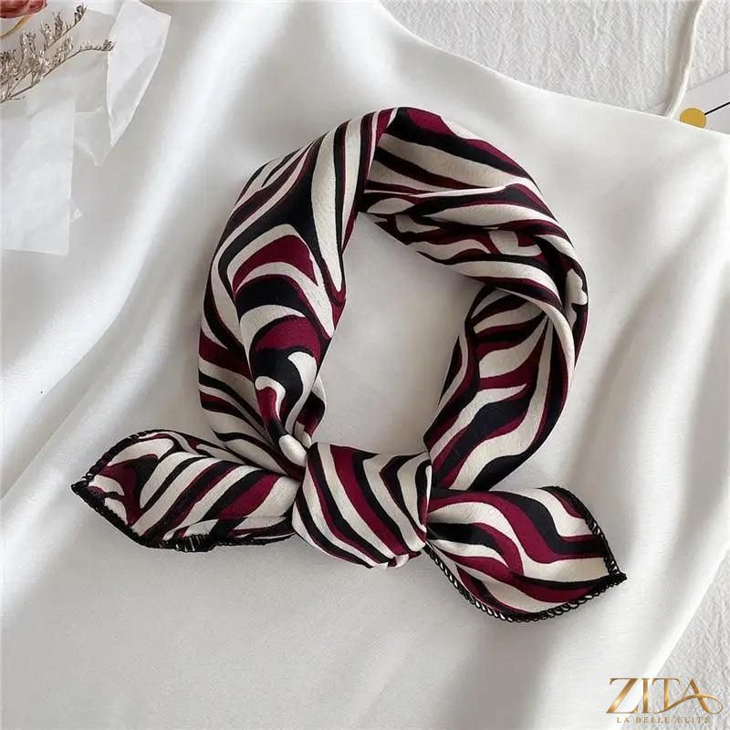 Printed square silk neck scarf by Zita La Belle Elite, featuring a fashionable floral design, ideal for versatile women’s accessories.