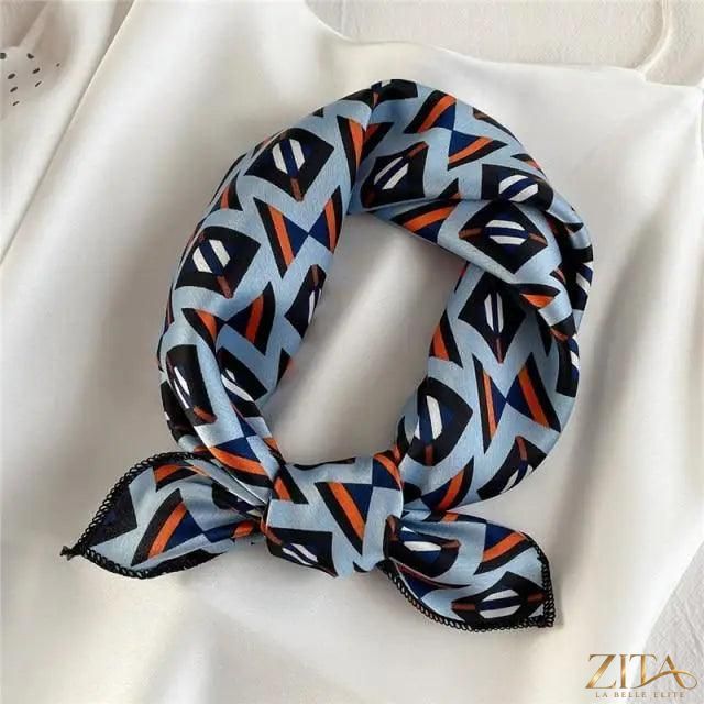 Printed square silk neck scarf for women by Zita La Belle Elite, featuring a fashionable, versatile design in vibrant colors.