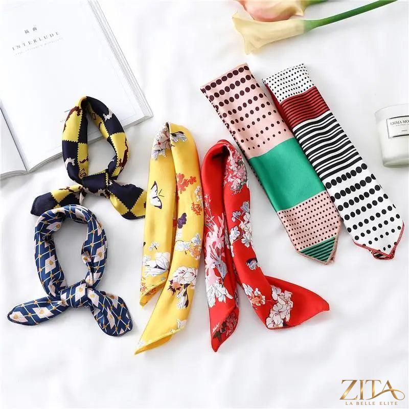 Printed square silk neck scarf by Zita La Belle Elite, featuring vibrant patterns, perfect for stylish women’s fashion accessories.