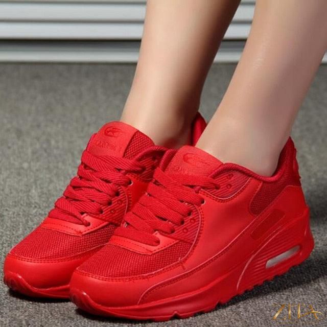 Women’s breathable platform sneakers by Zita La Belle Elite with air cushions in green, black, and pink, lightweight and sporty.